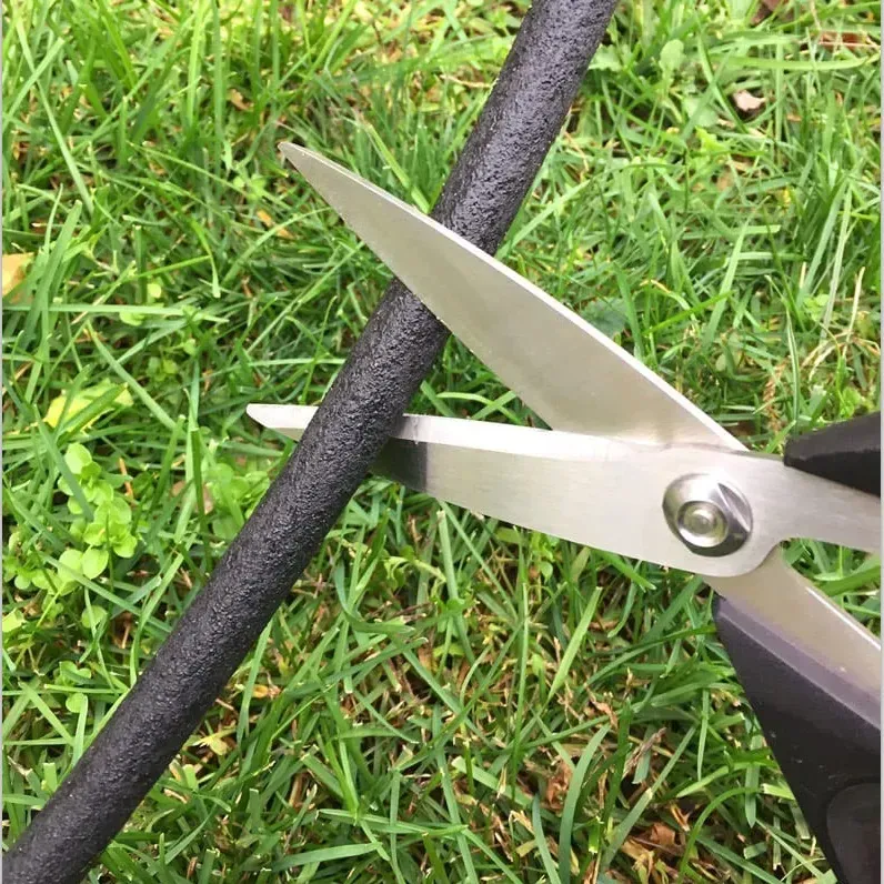 pitta 5/8 inch soaker hose connected with fittings in a garden bed