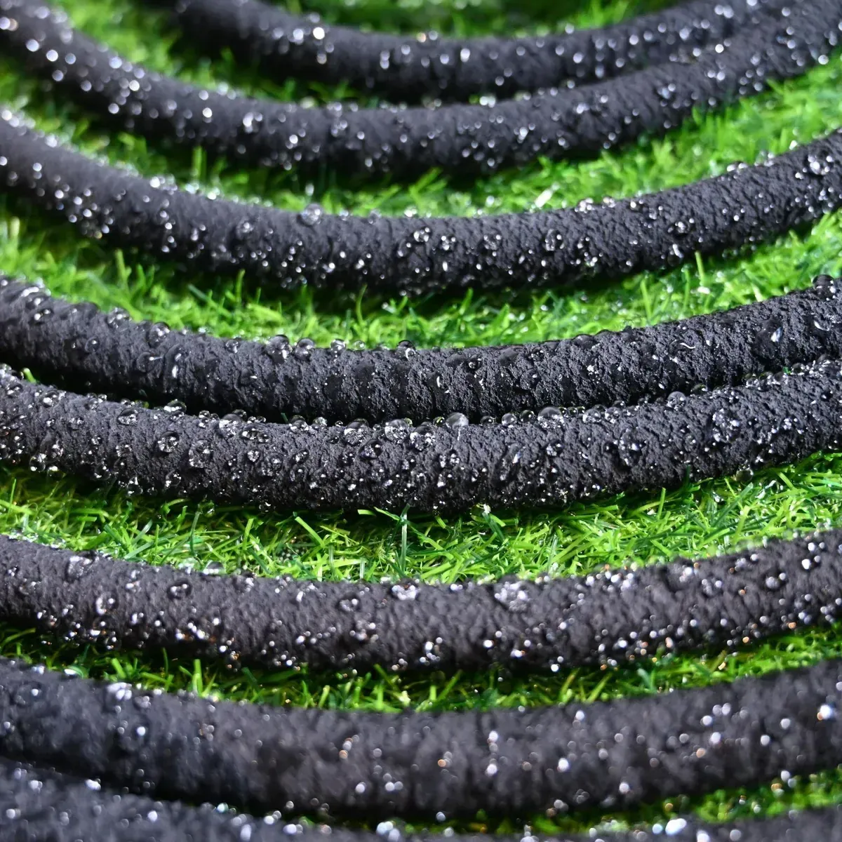 pitta PE seepage hose running through a greenhouse bed